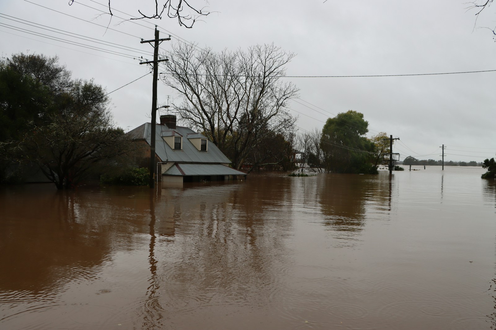 a flooded area with a house